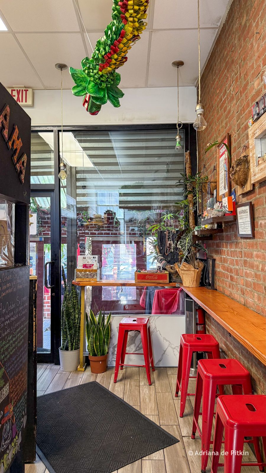 Red stools and window seating