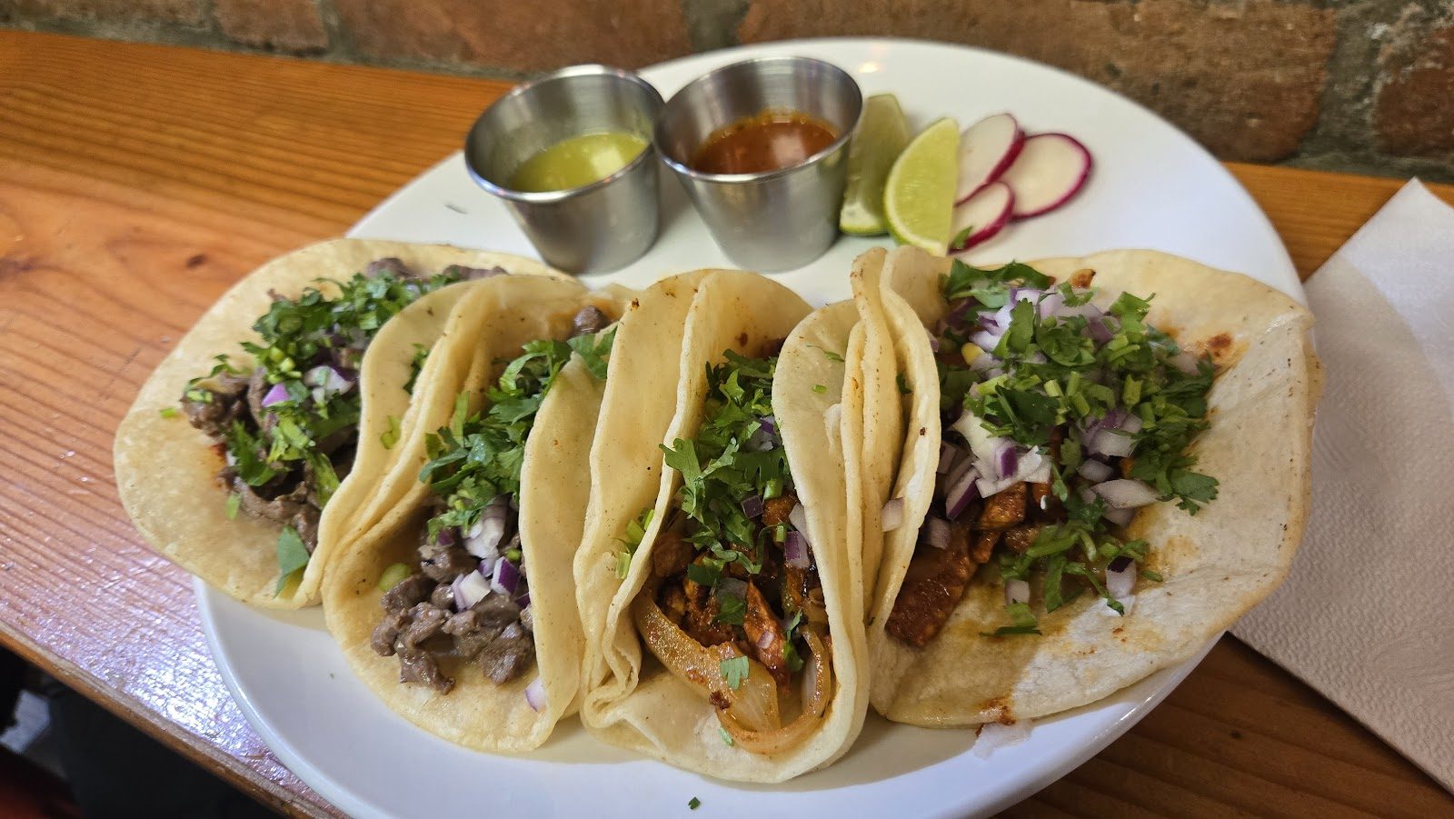 Assorted meat tacos with salsas